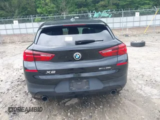 2018 BMW X2 sDrive28i z VIN WBXYJ3C31JEJ84394, wystawiony jako IAAI lot #42364160 z przebiegiem Nie podano mil oraz . Historia ofert i sprzedaży dostępna na DreamBid. Obrazek 16.
