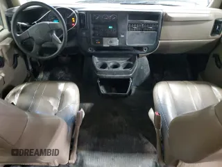 2007 Chevrolet Express Passenger z VIN 1GAHG39U571248683, wystawiony jako Copart lot #41487325 z przebiegiem 126 216 mil mil oraz Szkoda całkowita • Salvage title. Historia ofert i sprzedaży dostępna na DreamBid. Obrazek 8.