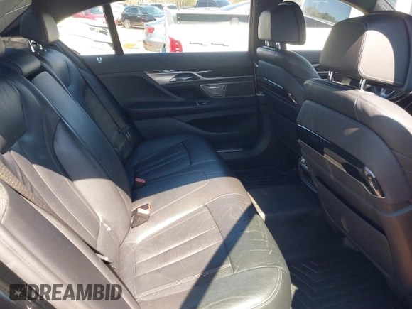 2019 BMW 7 Series 740i xDrive with VIN WBA7E4C57KGV70521, listed as a IAAI auction lot 41881538 with 114,480 mi miles and . Bid and sale history available at DreamBid. Image 8.