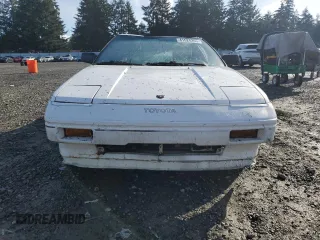 1988 Toyota MR2 z VIN JT2AW15CXJ0126257, wystawiony jako Copart lot #41524265 z przebiegiem 243 342 mil mil oraz Szkody całkowita. Historia ofert i sprzedaży dostępna na DreamBid. Obrazek 5.