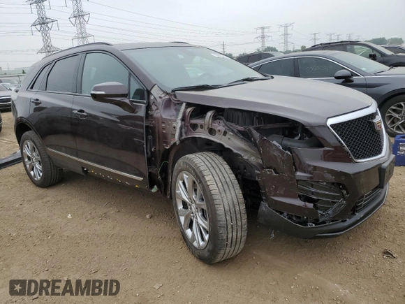 2021 Cadillac XT5 AWD Sport with VIN 1GYKNGRS2MZ142286, listed as a Copart auction lot 60699515 with 17,406 mi miles and Salvage title. Bid and sale history available at DreamBid. Image 4.