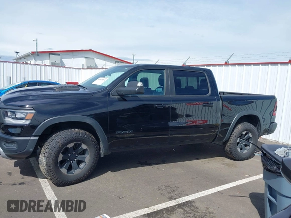 2019 Ram 1500 Rebel with VIN 1C6SRFLT2KN592652, listed as a IAAI auction lot 41989054 with 71,630 mi miles and . Bid and sale history available at DreamBid. Image 14.