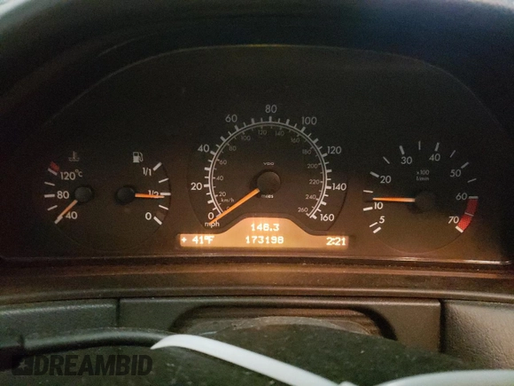1999 Mercedes-Benz E-Class with VIN WDBJF82H4XX021888, listed as a Copart auction lot 83069274 with 173,198 mi miles and Salvage Title. Bid and sale history available at carsss.com. Image 9.