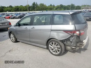 2014 Mazda 5 Grand Touring with VIN JM1CW2DL1E0165803, listed as a Copart auction lot 62914124 with 71,127 mi miles and Salvage Title. Bid and sale history available at carsss.com. Image 2.