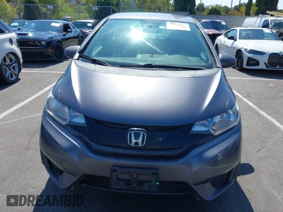 2015 Honda Fit LX with VIN 3HGGK5G54FM731965, listed as a IAAI auction lot 42655355 with 141,205 mi miles and . Bid and sale history available at DreamBid. Image 12.