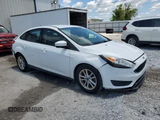 2018 Ford Focus SE with VIN 1FADP3F23JL245856, listed as a Copart auction lot 62343745 with 51,076 mi miles and Salvage title. Bid and sale history available at DreamBid. Image 4.
