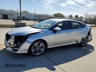 2018 Honda Clarity with VIN JHMZC5F15JC009044, listed as a Copart auction lot 45878643 with 61,009 mi miles. Bid and sale history available at carsss.com. Image 1.