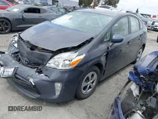 2013 Toyota Prius One with VIN JTDKN3DU9D5607855, listed as a IAAI auction lot 41728716 with 123,643 mi miles. Bid and sale history available at carsss.com. Image 2.
