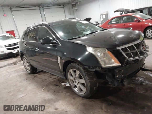 2011 Cadillac SRX Performance Collection with VIN 3GYFNEEY9BS533994, listed as a IAAI auction lot 40990072 with 168,134 mi miles. Bid and sale history available at carsss.com. Image 1.