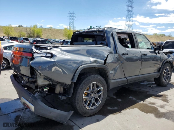 2023 Rivian R1T Launch Edition with VIN 7FCTGAALXPN020447, listed as a Copart auction lot 54154844 with 9,527 mi miles and Non Repairable. Bid and sale history available at carsss.com. Image 3.