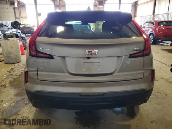 2024 Cadillac XT4 AWD Luxury with VIN 1GYFZBR48RF242850, listed as a Copart auction lot 52290865 with 1,524 mi miles and Salvage Title. Bid and sale history available at carsss.com. Image 6.