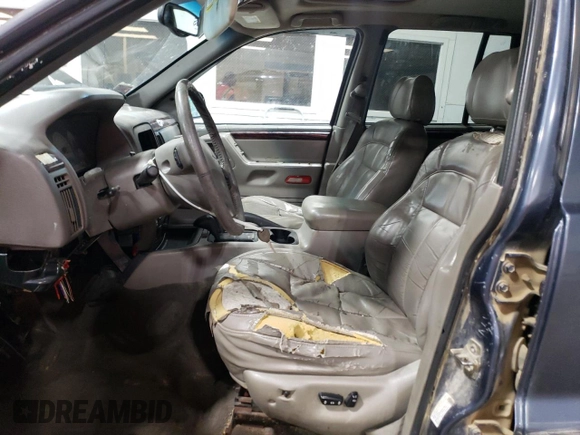 2001 Jeep Grand Cherokee Limited with VIN 1J4GW58N01C664996, listed as a Copart auction lot 58339825 with 288,153 mi miles and Salvage title. Bid and sale history available at DreamBid. Image 7.