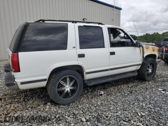 1999 GMC Yukon with VIN 1GKEK13R8XJ723636, listed as a Copart auction lot 64458594 with 0 mi miles and Non Repairable. Bid and sale history available at carsss.com. Image 3.