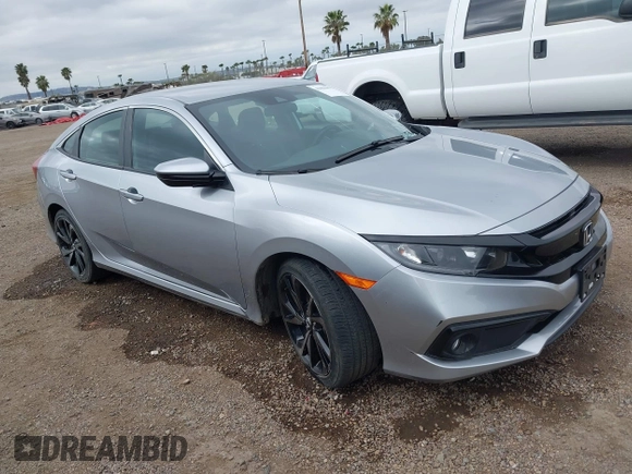 2021 Honda Civic Sport with VIN 2HGFC2F83MH510243, listed as a IAAI auction lot 41856857 with 95,739 mi miles and . Bid and sale history available at DreamBid. Image 1.