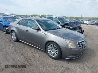 2012 Cadillac CTS Luxury with VIN 1G6DE5E56C0132613, listed as a IAAI auction lot 42116862 with 81,617 mi miles and . Bid and sale history available at DreamBid. Image 1.