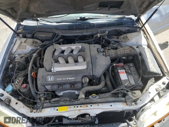 2002 Honda Accord EX z VIN 1HGCG16572A069123, wystawiony jako Copart lot #55861375 z przebiegiem 117 455 mil mil oraz Szkoda całkowita • Salvage title. Historia ofert i sprzedaży dostępna na DreamBid. Obrazek 11.