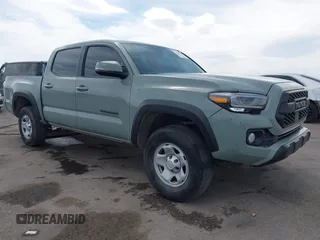 2022 Toyota Tacoma SR with VIN 3TMCZ5AN0NM507320, listed as a IAAI auction lot 42220296 with 33,342 mi miles and . Bid and sale history available at DreamBid. Image 1.