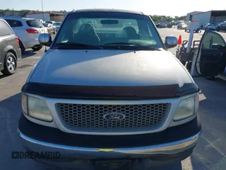 1999 Ford F-150 with VIN 1FTZF1727XKA60617, listed as a IAAI auction lot 41980403 with 98,481 mi miles and . Bid and sale history available at DreamBid. Image 6.
