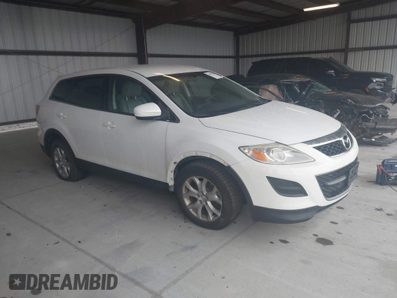 2012 Mazda CX-9 Touring with VIN JM3TB3CV5C0357962, listed as a IAAI auction lot 41997998 with 125,823 mi miles and . Bid and sale history available at carsss.com. Image 1.