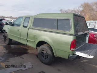 1997 Ford F-150 XL with VIN 1FTDX1861VKA60604, listed as a IAAI auction lot 41060909 with 269,715 mi miles. Bid and sale history available at carsss.com. Image 3.