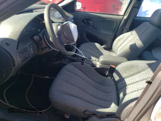 2005 Chevrolet Cavalier with VIN 1G1JC52FX57159304, listed as a Copart auction lot 44377315 with 143,556 mi miles and Salvage Title. Bid and sale history available at DreamBid. Image 7.