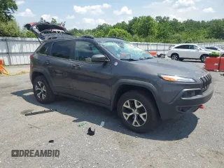 2017 Jeep Cherokee Trailhawk with VIN 1C4PJMBS2HW524373, listed as a Copart auction lot 62162765 with 67,429 mi miles and Salvage title. Bid and sale history available at DreamBid. Image 4.