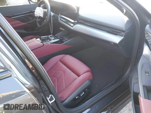 2024 BMW i5 eDrive40 with VIN WBY33FK09RCR42126, listed as a IAAI auction lot 41370577 with 9,601 mi miles and . Bid and sale history available at DreamBid. Image 5.