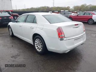2014 Chrysler 300 with VIN 2C3CCAAG5EH128036, listed as a IAAI auction lot 41988327 with 153,809 mi miles. Bid and sale history available at carsss.com. Image 3.