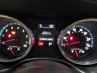 2013 Jeep Grand Cherokee Overland with VIN 1C4RJFCT9DC524605, listed as a IAAI auction lot 42016103 with 215,352 mi miles. Bid and sale history available at carsss.com. Image 7.