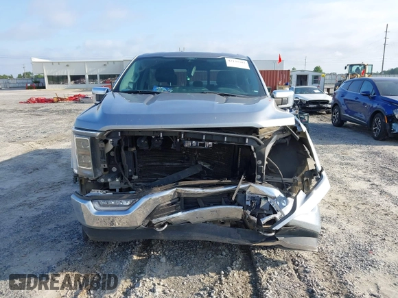 2021 Ford F-150 XL with VIN 1FTFW1E83MKD68308, listed as a IAAI auction lot 42137302 with 71,725 mi miles and . Bid and sale history available at DreamBid. Image 12.