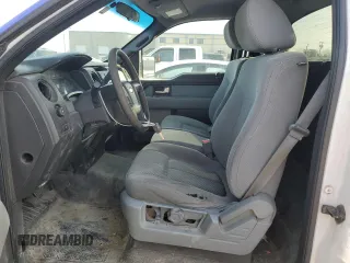 2014 Ford F-150 XL with VIN 1FTMF1CM2EKD70205, listed as a Copart auction lot 43963335 with 214,912 mi miles and Salvage title. Bid and sale history available at DreamBid. Image 7.