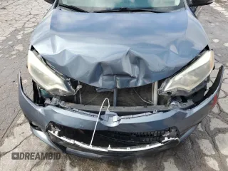 2014 Toyota Corolla L with VIN 2T1BURHE7EC116049, listed as a Copart auction lot 61651345 with 148,954 mi miles and Salvage title. Bid and sale history available at DreamBid. Image 11.