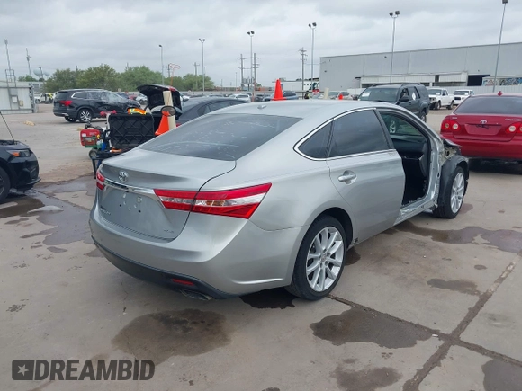 2015 Toyota Avalon Limited with VIN 4T1BK1EB2FU149980, listed as a IAAI auction lot 41897411 with 136,507 mi miles and . Bid and sale history available at DreamBid. Image 4.
