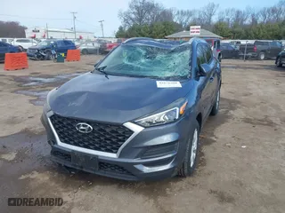 2019 Hyundai Tucson Value with VIN KM8J33A40KU999340, listed as a IAAI auction lot 41876380 with 52,752 mi miles. Bid and sale history available at carsss.com. Image 17.