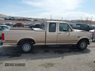 1996 Ford F-150 with VIN 1FTEX15H9TKA25252, listed as a IAAI auction lot 41881908 with 161,371 mi miles. Bid and sale history available at carsss.com. Image 13.