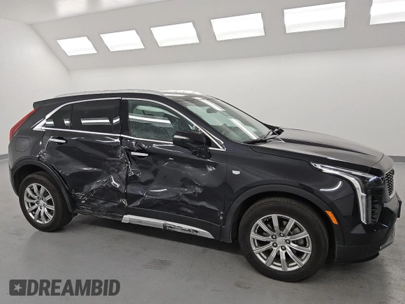 2023 Cadillac XT4 AWD Premium Luxury z VIN 1GYFZDR42PF174473, wystawiony jako Copart lot #55953305 z przebiegiem 42 268 mil mil oraz Szkoda całkowita • Salvage title. Historia ofert i sprzedaży dostępna na DreamBid. Obrazek 4.