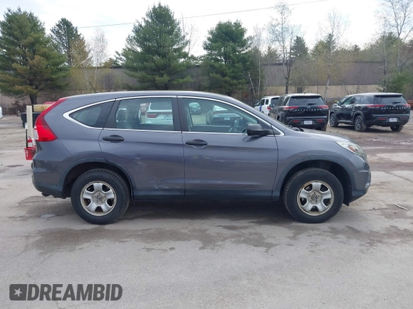 2015 Honda CR-V LX with VIN 5J6RM4H34FL031089, listed as a IAAI auction lot 42123159 with 74,566 mi miles and . Bid and sale history available at DreamBid. Image 13.