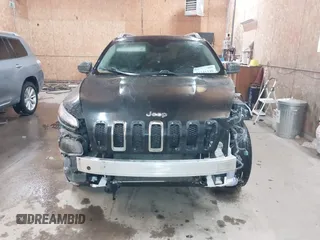 2014 Jeep Cherokee Limited z VIN 1C4PJMDS0EW240958, wystawiony jako IAAI lot #41541340 z przebiegiem 140 625 mil mil oraz . Historia ofert i sprzedaży dostępna na DreamBid. Obrazek 12.