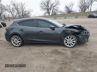 2014 Mazda 3 S Touring with VIN JM1BM1L30E1200337, listed as a IAAI auction lot 41906333 with 92,873 mi miles and . Bid and sale history available at DreamBid. Image 13.