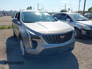 2023 Cadillac XT4 FWD Luxury with VIN 1GYAZAR4XPF116698, listed as a IAAI auction lot 40594015 with 18,368 mi miles. Bid and sale history available at carsss.com. Image 1.
