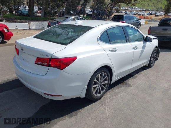 2020 Acura TLX w/Technology Pkg with VIN 19UUB1F56LA008852, listed as a IAAI auction lot 41904628 with 121,478 mi miles. Bid and sale history available at carsss.com. Image 4.