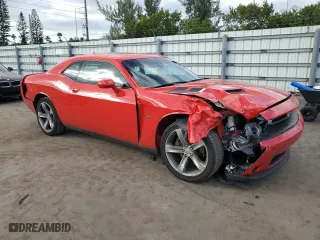 2015 Dodge Challenger R/T with VIN 2C3CDZAT4FH737497, listed as a Copart auction lot 42620365 with 67,579 mi miles and Salvage Title. Bid and sale history available at carsss.com. Image 4.
