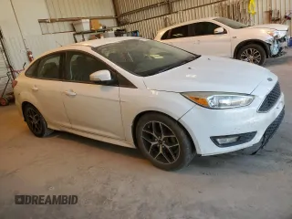 2016 Ford Focus SE with VIN 1FADP3F2XGL253039, listed as a Copart auction lot 45590535 with 104,933 mi miles and Salvage Title. Bid and sale history available at carsss.com. Image 4.