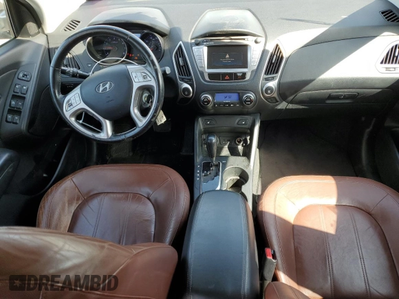 2010 Hyundai Tucson GLS with VIN KM8JU3AC8AU056499, listed as a Copart auction lot 53057365 with 119,906 mi miles and Salvage Title. Bid and sale history available at DreamBid. Image 8.