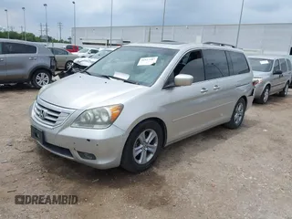 2009 Honda Odyssey Touring z VIN 5FNRL38979B052923, wystawiony jako IAAI lot #42427207 z przebiegiem 201 483 mil mil oraz . Historia ofert i sprzedaży dostępna na DreamBid. Obrazek 2.
