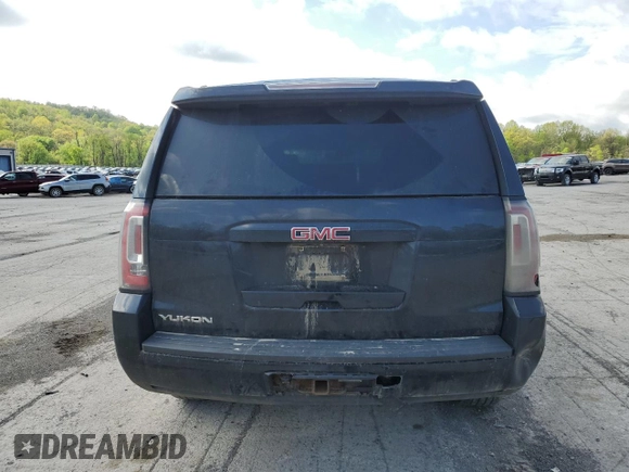 2015 GMC Yukon SLT with VIN 1GKS2BKC6FR145140, listed as a Copart auction lot 55451365 with 216,522 mi miles and Salvage Title. Bid and sale history available at DreamBid. Image 6.