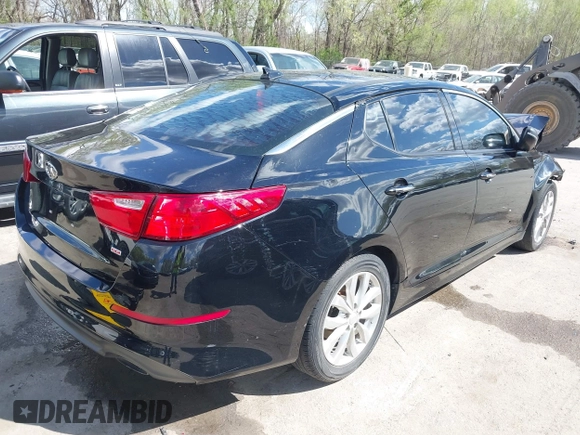 2015 Kia Optima EX with VIN 5XXGN4A79FG502953, listed as a IAAI auction lot 42009927 with 144,284 mi miles and . Bid and sale history available at DreamBid. Image 4.