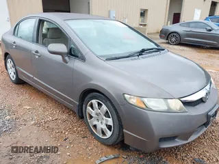 2009 Honda Civic LX z VIN 2HGFA16559H538137, wystawiony jako IAAI lot #42349359 z przebiegiem 176 917 mil mil oraz . Historia ofert i sprzedaży dostępna na DreamBid. Obrazek 1.