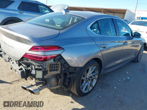 2022 Genesis G70 2.0T with VIN KMTG34TA9NU093023, listed as a IAAI auction lot 40989282 with 50,036 mi miles. Bid and sale history available at carsss.com. Image 4.