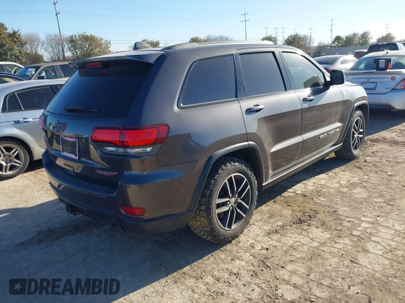 2018 Jeep Grand Cherokee Trailhawk with VIN 1C4RJFLT9JC244212, listed as a IAAI auction lot 41443469 with 77,953 mi miles and . Bid and sale history available at DreamBid. Image 4.
